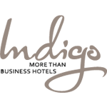 Indigo Hotels logo featuring elegant typography and a tagline about business hotels.